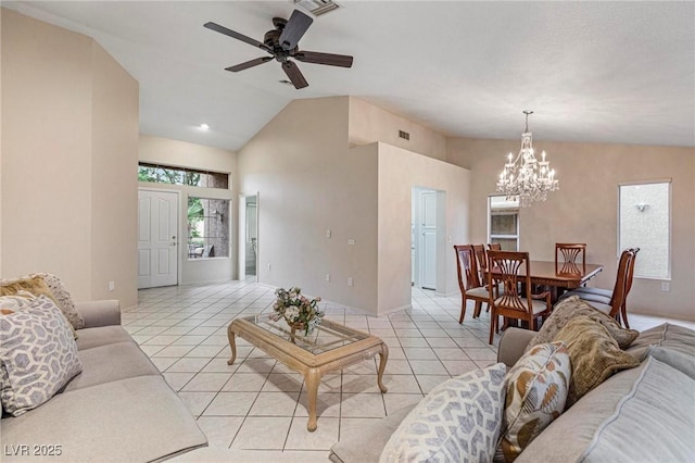 8901 Litchfield Ave, Las Vegas, NV 89134 - living area with light tile patterned floors, high vaulted ceiling, and ceiling fan with notable chandelier