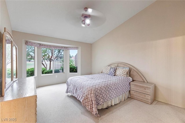 8901 Litchfield Ave, Las Vegas, NV 89134 - bedroom with lofted ceiling, light carpet, and ceiling fan