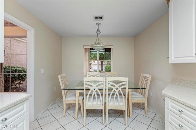 8901 Litchfield Ave, Las Vegas, NV 89134 - dining room with light tile patterned floors, baseboards, and visible vents