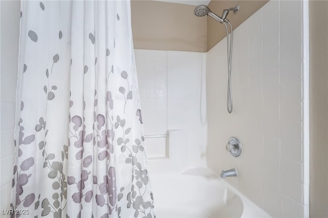 full bath featuring shower / bath combo with shower curtain