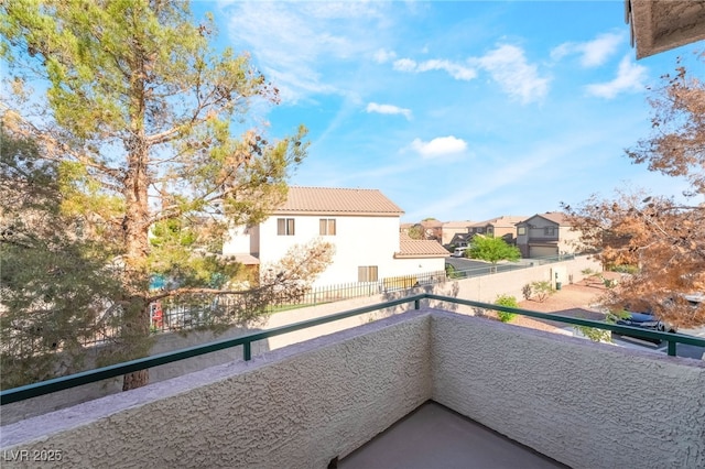 balcony featuring a residential view