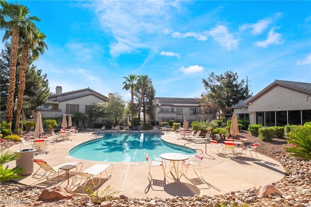 pool with a patio area