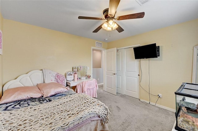 6231 Portland Treaty Ave, Las Vegas, NV 89122 - carpeted bedroom featuring baseboards, ceiling fan, a closet, and visible vents