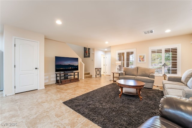 living area featuring stairs, recessed lighting, visible vents, and light tile patterned floors