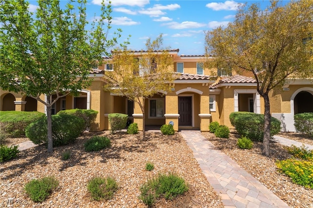 3088 Bicentennial Pkwy, Henderson, NV 89044 - mediterranean / spanish home featuring stucco siding and a tile roof
