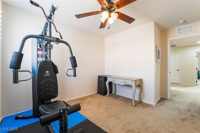 exercise room featuring carpet flooring, a ceiling fan, baseboards, and visible vents