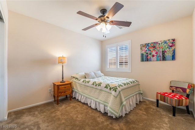 carpeted bedroom with baseboards and ceiling fan