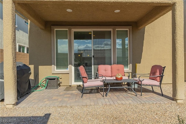 view of patio with a grill