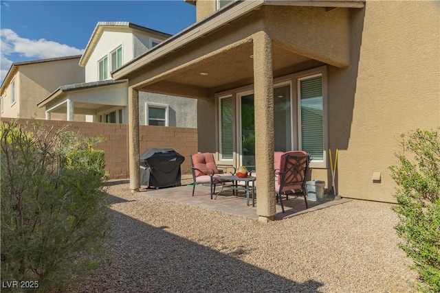 view of patio / terrace with fence and area for grilling