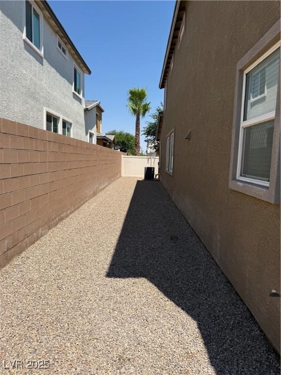7175 Steubling Glen St, North Las Vegas, NV 89084 - view of home's exterior with stucco siding