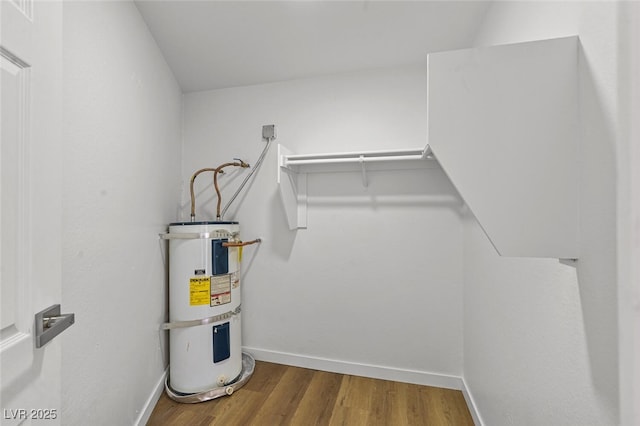 utility room with water heater