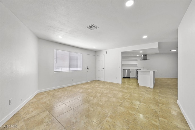 unfurnished living room with baseboards, recessed lighting, and visible vents