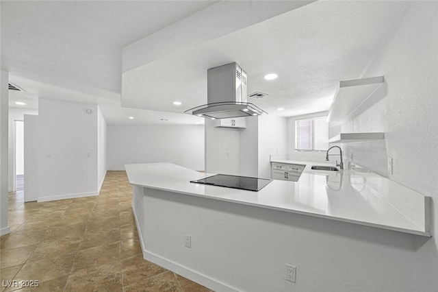 kitchen with island exhaust hood, open shelves, a sink, a peninsula, and black electric stovetop