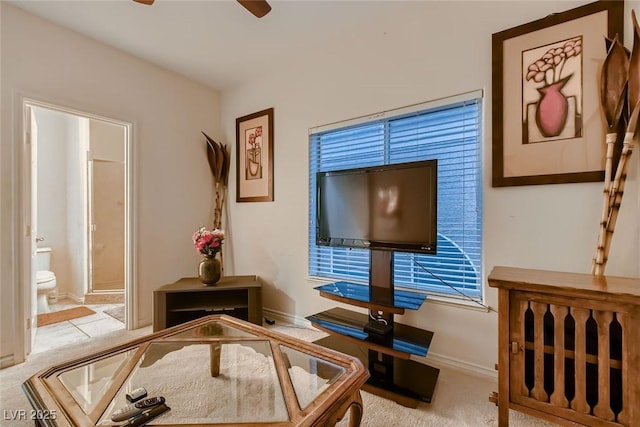 6750 Quapaw St, Las Vegas, NV 89149 - living area with baseboards, a ceiling fan, and carpet