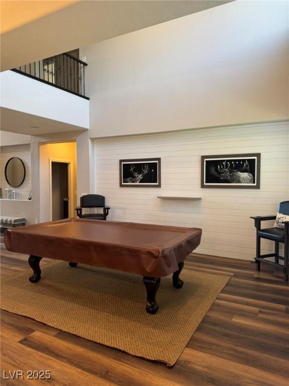 rec room with pool table and wood finished floors