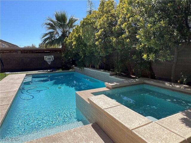 view of swimming pool with a fenced in pool and a fenced backyard