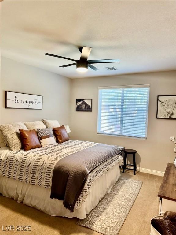 7109 Rancho De Taos, Las Vegas, NV 89130 - carpeted bedroom with a ceiling fan and baseboards