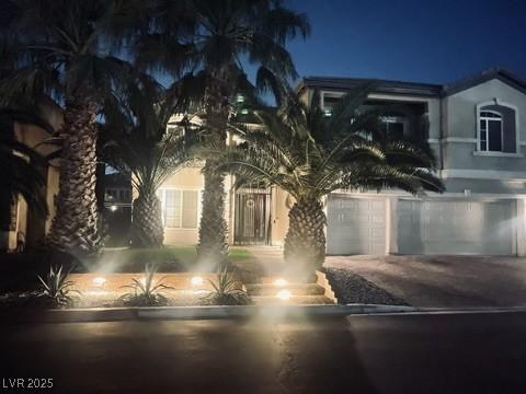 7109 Rancho De Taos, Las Vegas, NV 89130 - obstructed view of property featuring driveway and a garage