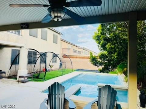 7109 Rancho De Taos, Las Vegas, NV 89130 - view of pool featuring ceiling fan, a pool with connected hot tub, and a patio area
