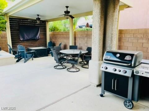 7109 Rancho De Taos, Las Vegas, NV 89130 - view of patio / terrace with ceiling fan, outdoor dining area, fence, and grilling area