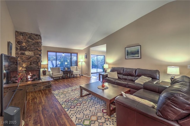 living room with wood finished floors and lofted ceiling