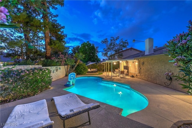 view of pool with a patio, fence, and a fenced in pool