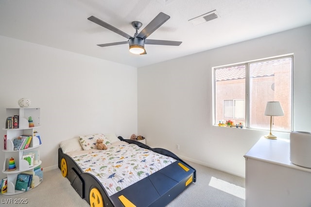 bedroom featuring baseboards, visible vents, and carpet