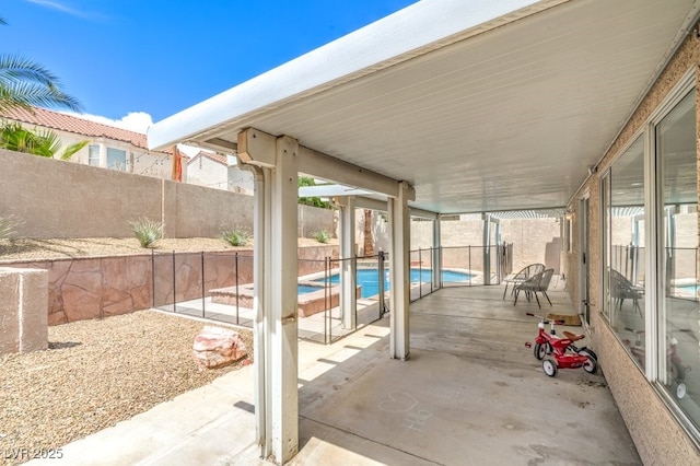 view of patio / terrace with a fenced in pool and a fenced backyard