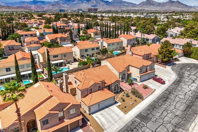drone / aerial view with a mountain view and a residential view