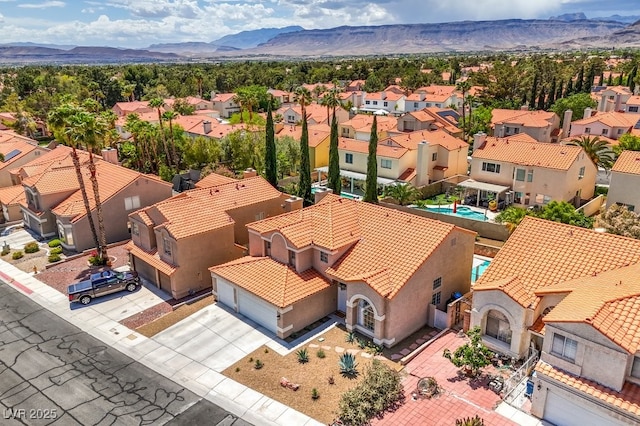 birds eye view of property featuring a residential view and a mountain view