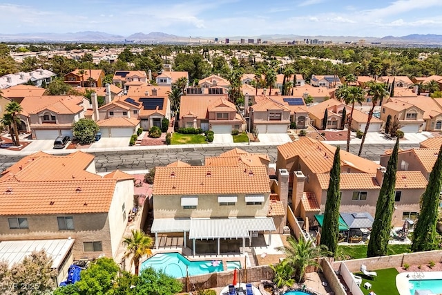 bird's eye view featuring a residential view and a mountain view