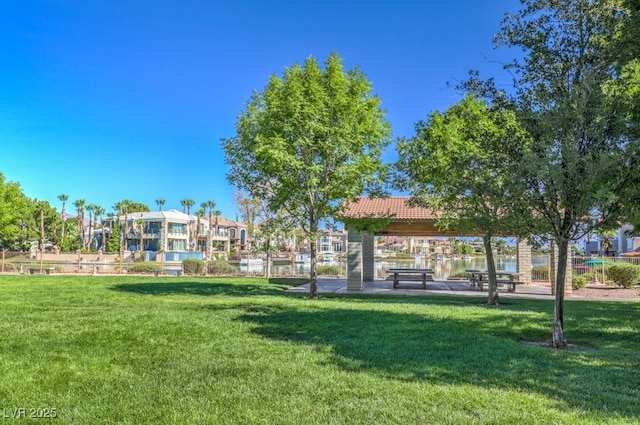 view of home's community with a yard and a gazebo