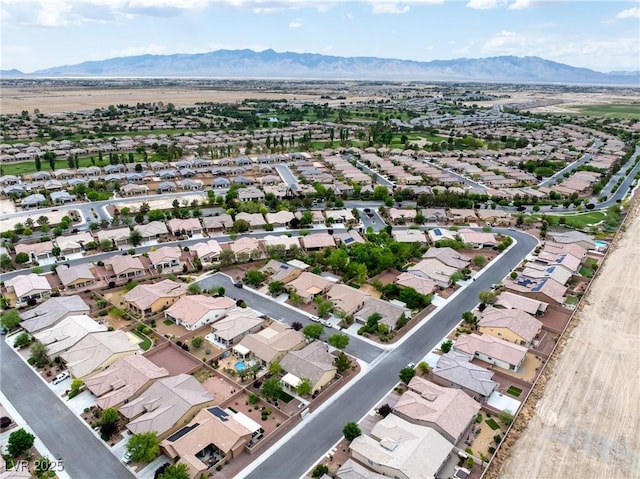 drone / aerial view with a mountain view and a residential view