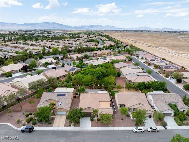 bird's eye view featuring a mountain view and a residential view