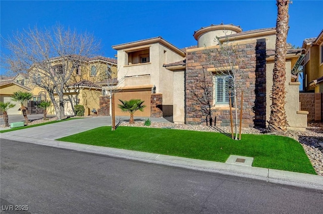 mediterranean / spanish house with stone siding, a garage, stucco siding, a front yard, and concrete driveway