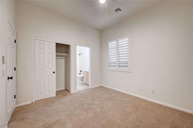 unfurnished bedroom with light colored carpet, baseboards, and visible vents