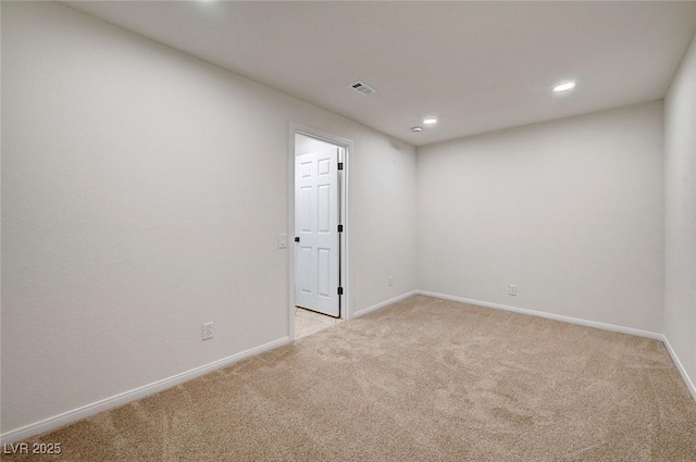 unfurnished room featuring baseboards, light carpet, recessed lighting, and visible vents