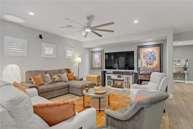 11249 Revelry Ln, Las Vegas, NV 89138 - living room featuring a ceiling fan, visible vents, recessed lighting, and light wood-style floors