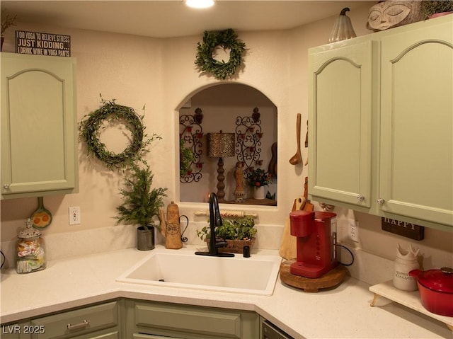 2050 W Warm Springs Rd Unit 411, Henderson, NV 89014 - kitchen with light countertops and a sink