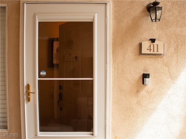 2050 W Warm Springs Rd Unit 411, Henderson, NV 89014 - view of exterior entry featuring stucco siding