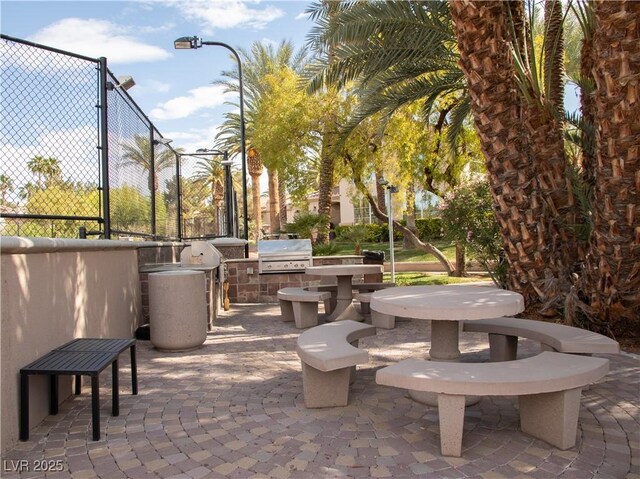 2050 W Warm Springs Rd Unit 411, Henderson, NV 89014 - view of property's community featuring an outdoor kitchen and a patio