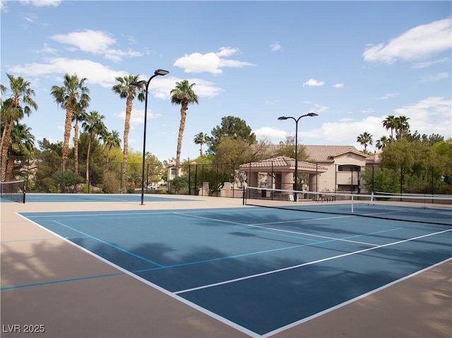 2050 W Warm Springs Rd Unit 411, Henderson, NV 89014 - view of tennis court featuring fence and community basketball court