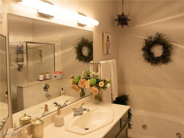 2050 W Warm Springs Rd Unit 411, Henderson, NV 89014 - bathroom featuring a whirlpool tub, a stall shower, and vanity