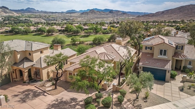 birds eye view of property featuring a mountain view and a residential view