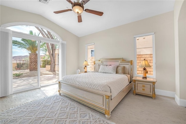bedroom with baseboards, ceiling fan, vaulted ceiling, and access to exterior