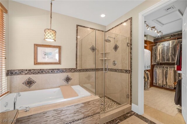 32 Cerchio Basso, Henderson, NV 89011 - bathroom with a stall shower, a garden tub, a spacious closet, and recessed lighting