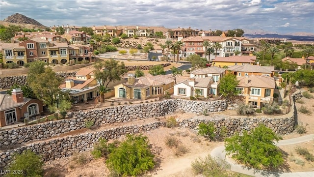 drone / aerial view featuring a mountain view and a residential view