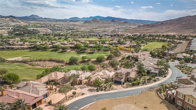 aerial view with a mountain view, golf course view, and a residential view