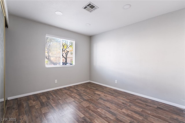 912 Falconhead Ln Unit 101, Las Vegas, NV 89128 - empty room featuring recessed lighting, baseboards, visible vents, and dark wood-style floors
