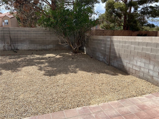 1249 Lucia Dr, Las Vegas, NV 89128 - view of yard with a fenced backyard